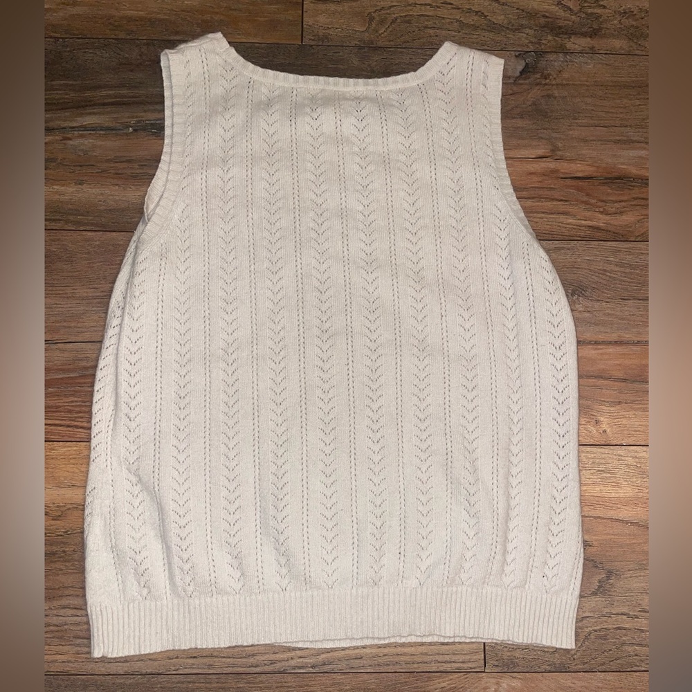 Cream beaded sweater vest. Very cute and soft, a little see through though
